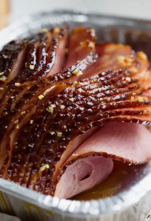 slow cook a precooked ham in the oven